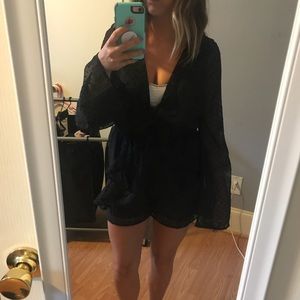 Black bell sleeve textured romper